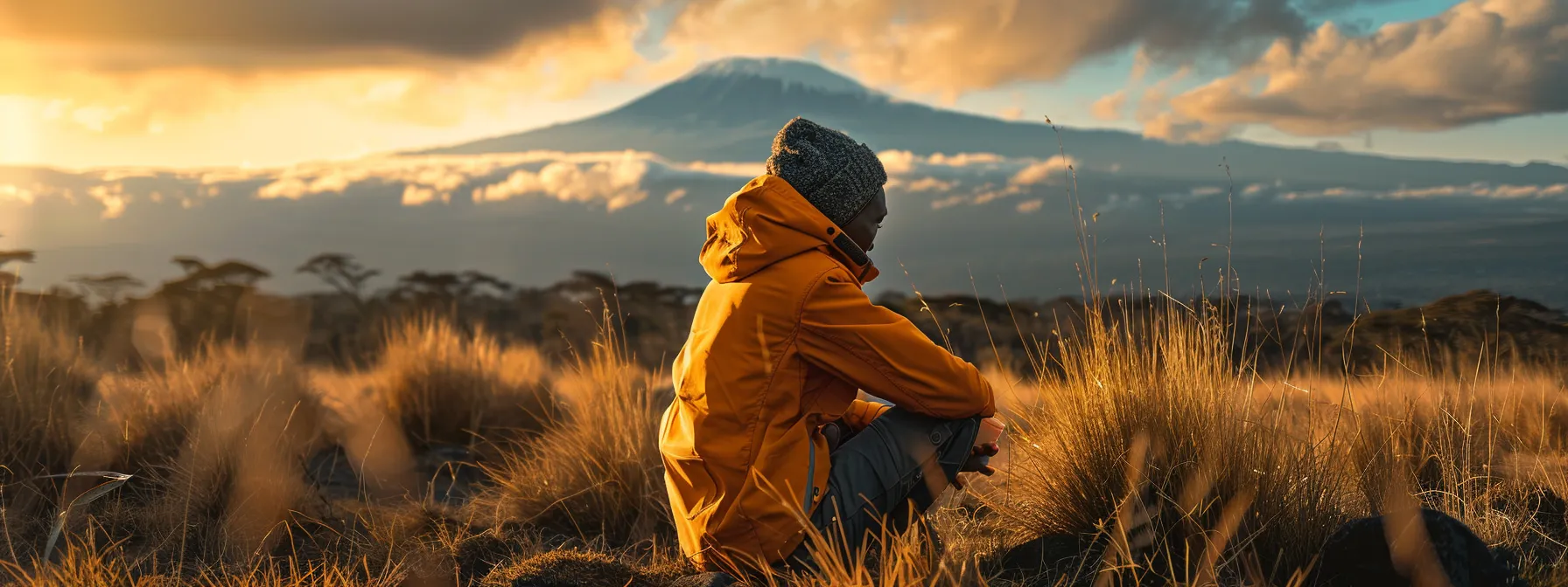 a person in orange county, ca preparing to take a dose of ozempic while overlooking the majestic mt. kilimanjaro in the background.